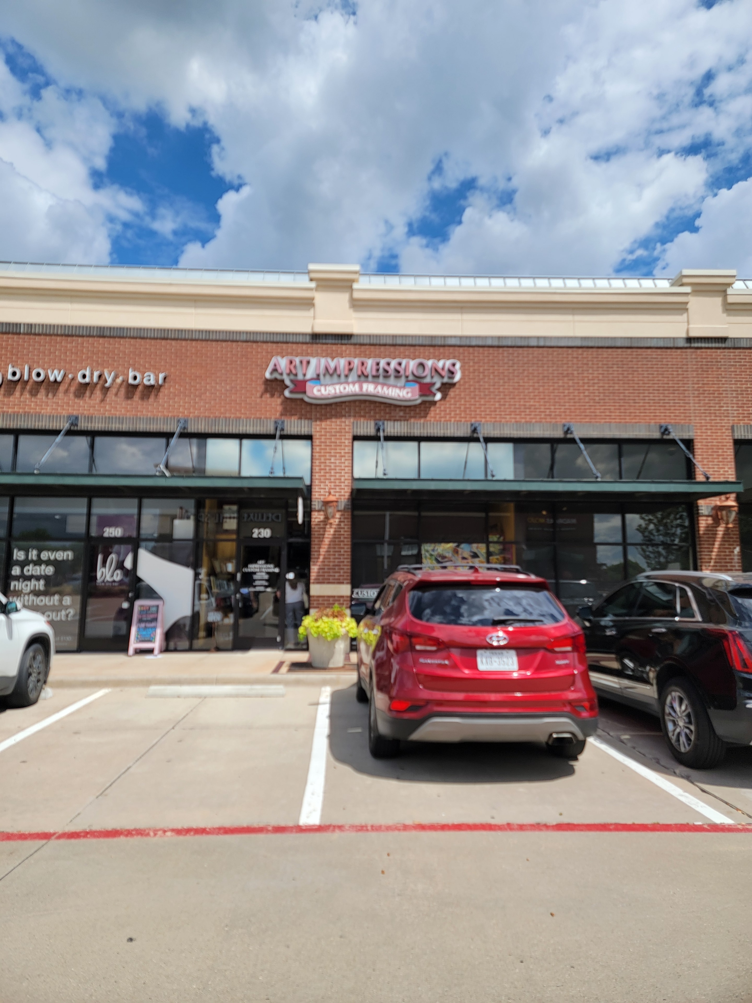 Art Impressions Custom Framing storefront sign
